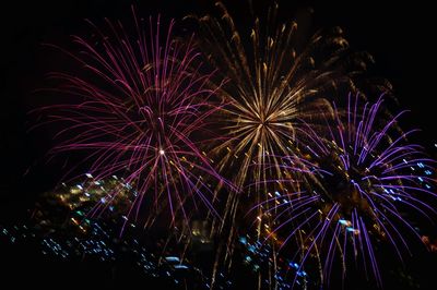 Low angle view of firework display