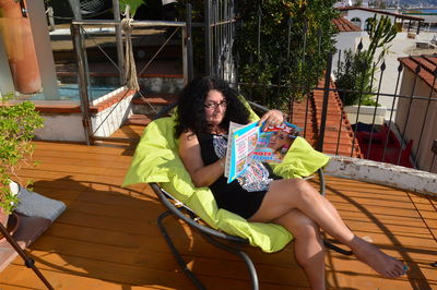 Woman sitting on chair