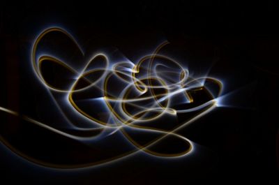 Light painting against black background