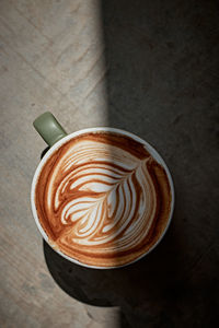 Coffee cup on table