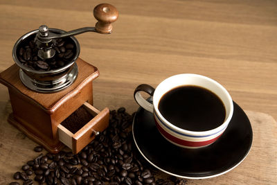 Close-up of coffee cup on table