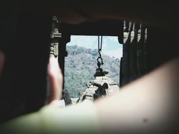 Human hand on building exterior