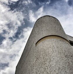 Low angle view of smoke stack against sky