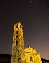 Low angle view of building against sky at night