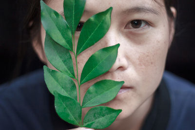 Close-up portrait of young woman