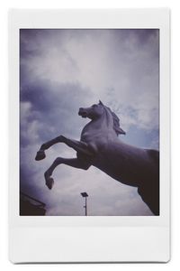 Low angle view of statue against sky