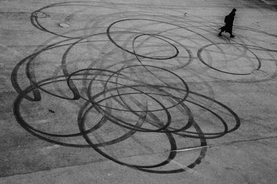 High angle view of child walking on street