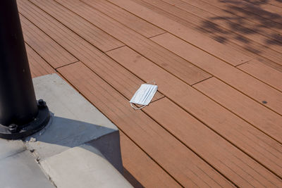 High angle view of shoes on wooden floor