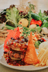 Close-up of fruit salad served on table