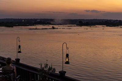 Scenic view of sea against sky at sunset