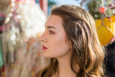 Side view of beautiful young woman