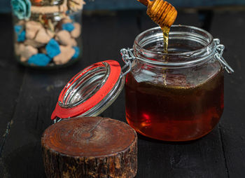 Close-up of glass jar on table