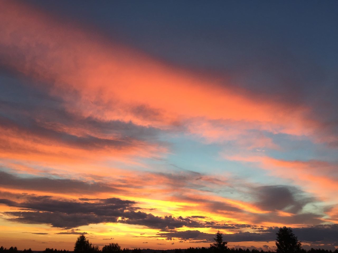 sunset, orange color, sky, silhouette, scenics, beauty in nature, tranquility, tranquil scene, cloud - sky, dramatic sky, nature, idyllic, low angle view, cloud, tree, cloudy, moody sky, landscape, outdoors, atmospheric mood