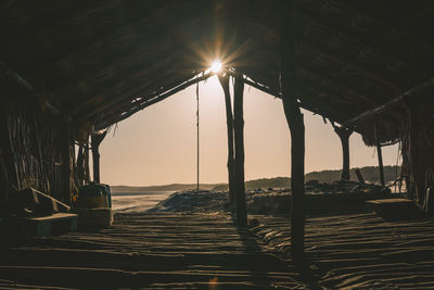 Scenic view of beach against sky during sunset