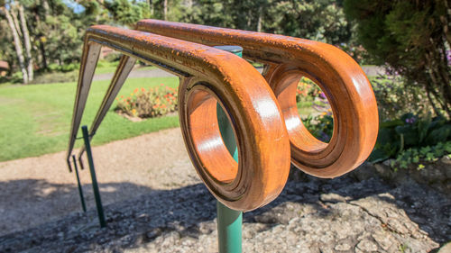 Close-up of handrail in park
