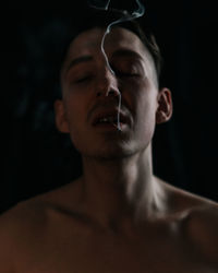 Portrait of shirtless man