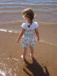 Full length of girl on beach