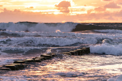 Scenic view of sea against sky during sunset