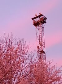 Low angle view of metallic structure against sky