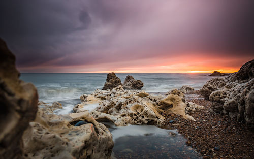 Scenic view of sea against sky during sunset