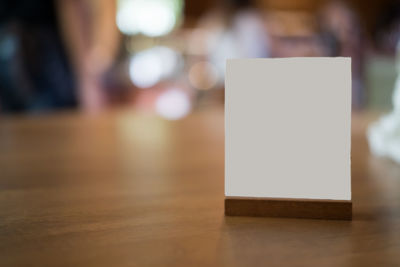 Close-up of paper on table