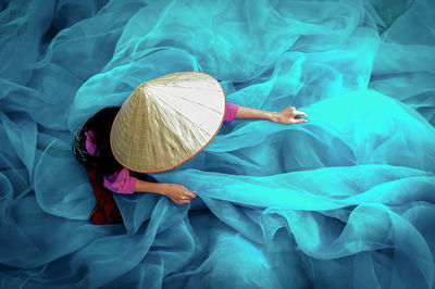 High angle view of woman with tulle netting