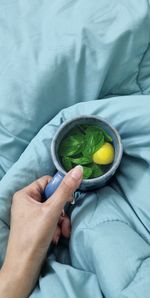 Midsection of woman holding food