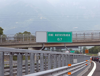 Road sign on bridge