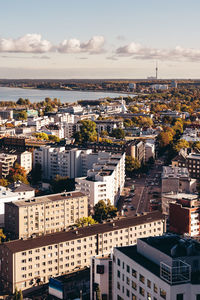 High angle view of buildings in city against sky