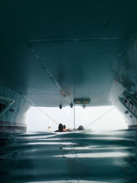 People by catamaran on sea