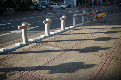 Shadow of bicycle on street