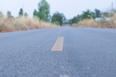 Surface level of road against the sky