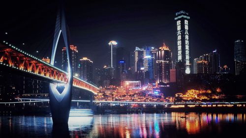 Low angle view of illuminated city at night