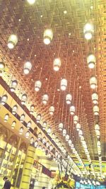 Low angle view of illuminated ceiling