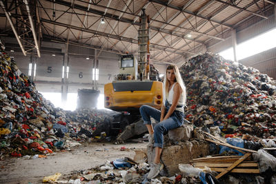 Young man working on garbage