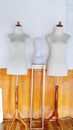 View of mannequin against wall