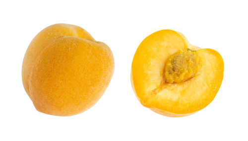 Close-up of orange against white background