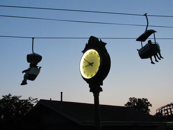 Low angle view of street light against clear sky