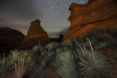 Red sandstone rock formation in remote arizona desert under a st