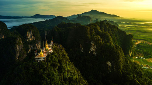 Scenic view of mountains against sky during sunset