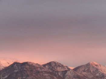 Scenic view of mountains against sky during sunset