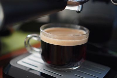 Close-up of coffee cup on table in cafe