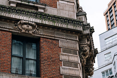 Low angle view of old building against sky