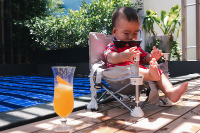 Side view of woman drinking glass
