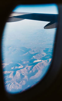 Aerial view of landscape seen from airplane window