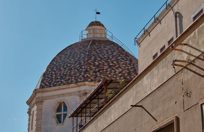 Low angle view of traditional building against clear sky