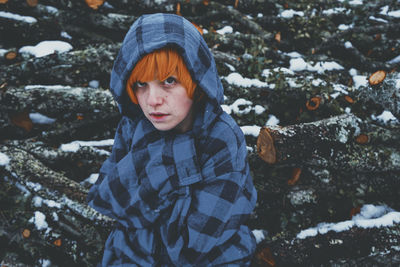 Portrait of boy in snow