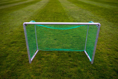 Empty bench on field