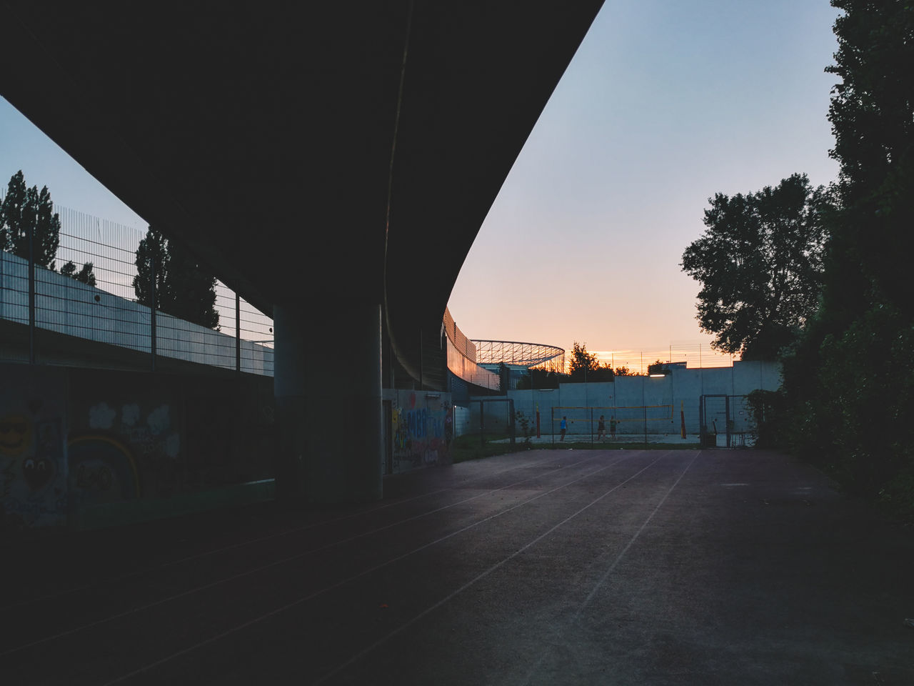 SILHOUETTE BRIDGE AGAINST SKY AT SUNSET