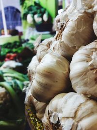 Close-up of garlic for sale at market stall